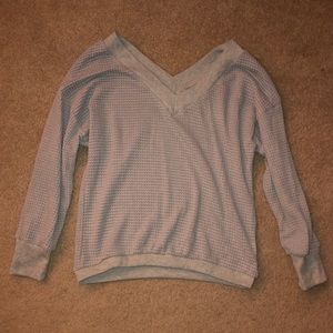 light grey sweater
